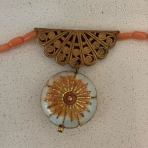 Elegant Gold and Orange Beaded Locket